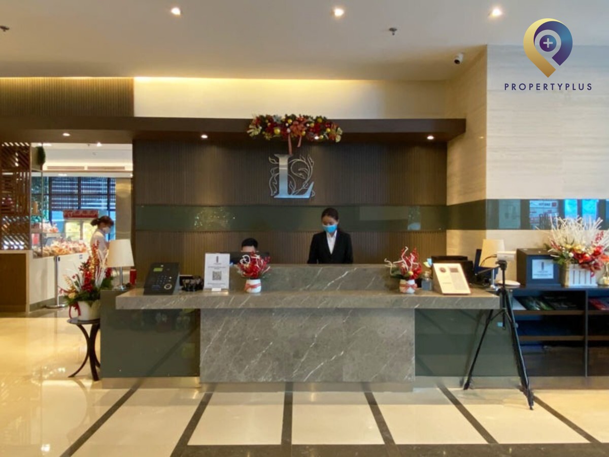 Reception desk at Lancaster building lobby with modern design